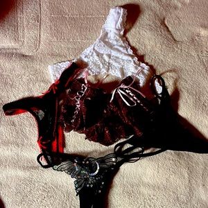 5 pairs of panties. 2 g-strings 2 thongs and 1 hipsters all new condition